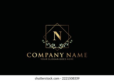 N Beauty vector initial logo, Golden floral letters with flowers leaves and gold splatters isolated on white background. Vector illustration for wedding, greeting cards, invitations template design
