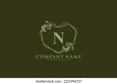 N Beauty vector initial logo, floral letters with flowers leaves and splatters isolated on white and black background. Vector illustration for wedding, greeting cards, invitations template design