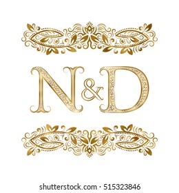 N and D vintage initials logo symbol. The letters are surrounded by ornamental elements. Wedding or business partners monogram in royal style.