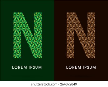 N , font, concept leaf and rock, designed using colors green and brown colors tone geometric shape on dark background, sign ,logo, symbol, icon, graphic, vector.