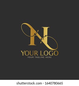 N Initial letter Gold Logo Icon classy gold letter suitable for boutique restaurant wedding service hotel or business identity.