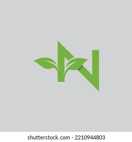 N Initial letter with green leaf