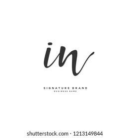I N IN Initial letter handwriting and  signature logo concept design