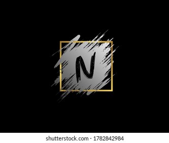 N Letter badge with Grunge Brush Stroke and Gold Frame. Vector logo template with Initial and signature style.