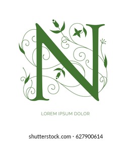 N letter floral design. Creative letter vector logo design. Letter decorated with swirls and flowers ornaments