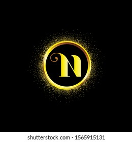 N letter golden icon in middle of golden sparking ring. N logo sign with empty center. Golden sparkling ring with dust glitter graphic on black background. Glorious decorative glowing shiny design.
