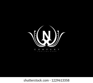 N letter linked monogram luxury rounded flourishes ornament logo