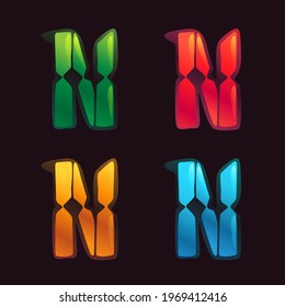 N letter logo in alarm clock style. Digital font in four color schemes for futuristic company identity, nightlife magazine, expressive posters.