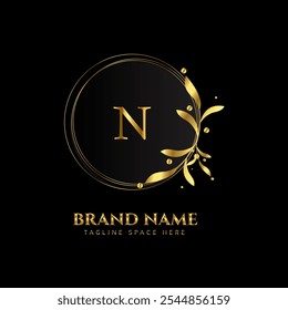 n letter logo design with golden color