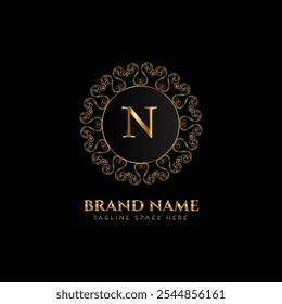 n letter logo design with golden color