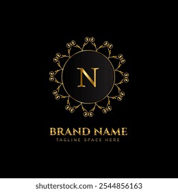 n letter logo design with golden color