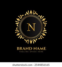 n letter logo design with golden color