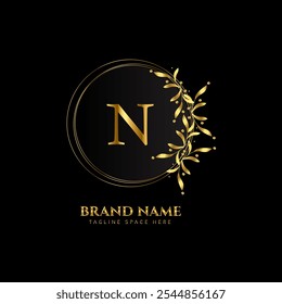 n letter logo design with golden color