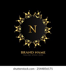 n letter logo design with golden color