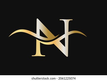 N Letter Logo Design. N Monogram Fashion Logo With Gold Color. Initial Letter N Logo Design Vector Template. 