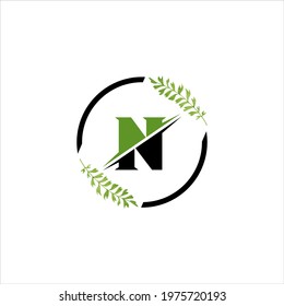 N letter logo design on black background. N creative initials letter logo concept. N letter design. 
N green and black letter design on black background. vector circle graphic design shape business si