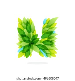 N letter logo formed by watercolor fresh green leaves. Brush stroke pattern. Vector ecology elements for posters, t-shirts and cards.
