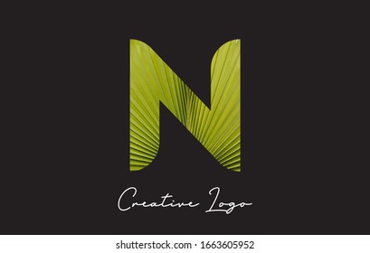 N Letter Logo with Palm Tree Leaf Pattern Design Vector Illustration.