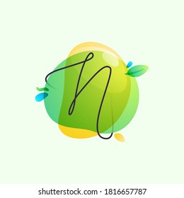 N letter logo placed on green watercolor blots. Overlapping splashes typeface can be used for ecology banner, natural lifestyle poster, vegan identity, etc.