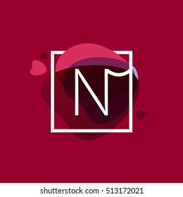 N letter logo in square frame at watercolor background with hearts. Happy Valentines Day design elements.