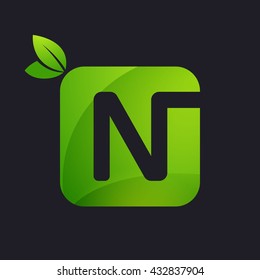 N letter logo with square and green leaves. 