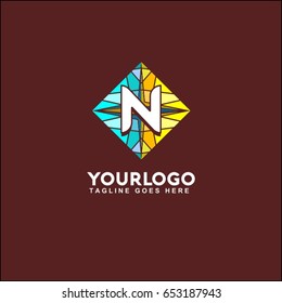 N letter mosaic in the circle logo. sea stones. bright vector