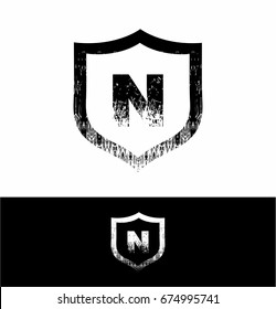 N Logo grunge design vector