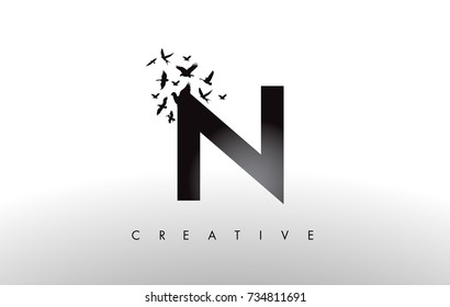 N Logo Letter with Flying Flock of Birds Disintegrating from the Letter. Bird Fly Letter Icon.