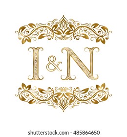 I and N vintage initials logo symbol. The letters are surrounded by ornamental elements. Wedding or business partners monogram in royal style.