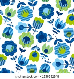 Naive folk style spring flowers seamless pattern. Decorative geometric floral ornament in blue and green colors for textile, background, wrapping paper, cards.
