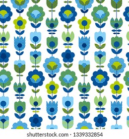 Naive folk style spring flowers seamless pattern. Decorative geometric floral ornament in blue and green colors for textile, background, wrapping paper, cards.
