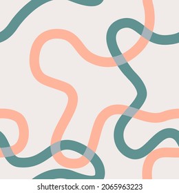 Naive seamless boho pattern with bright green and orange wavy lines on a light background. Creative contemporary minimalistic trendy boho background design for kids. Scandinavian nursery print 