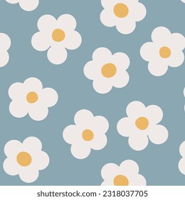 Naive seamless floral boho pattern with white daisies on a blue background in doodle style. Сute contemporary minimalistic trendy boho background design for kids. Scandinavian nursery print