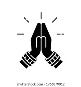 Namaste black glyph icon. Hindu greeting. Hands pressed together. Respectful salutation. Anjali Mudra. Praying hands. Asian gesture. Silhouette symbol on white space. Vector isolated illustration