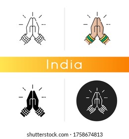 Namaste icon. Hindu greeting. Hands pressed together. Respectful salutation. Anjali Mudra. Praying hands. Indian religion. Linear black and RGB color styles. Isolated vector illustrations