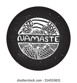 Namaste sign on chalkboard background. Detailed hand drawn zentangle logo for ethnic shop, yoga studio, travel agency and other heartful businesses. 