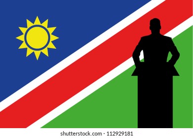 The Namibia Flag with a Silhouette of a man giving a speech