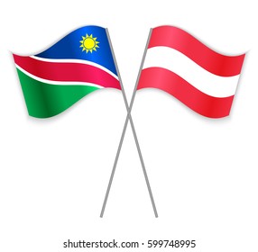 Namibian and Austrian crossed flags. Namibia combined with Austria isolated on white. Language learning, international business or travel concept.