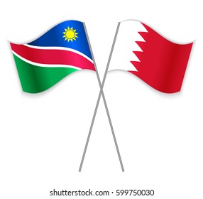 Namibian and Bahraini crossed flags. Namibia combined with Bahrain isolated on white. Language learning, international business or travel concept.
