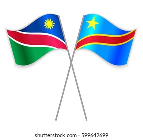 Namibian and Congolese crossed flags. Namibia combined with Democratic Republic of the Congo isolated on white. Language learning, international business or travel concept.