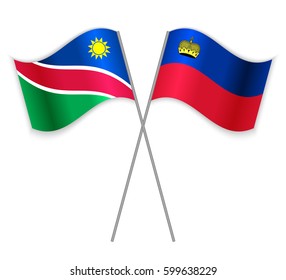 Namibian and Liechtenstein crossed flags. Namibia combined with Liechtenstein isolated on white. Language learning, international business or travel concept.