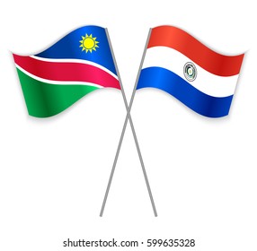 Namibian and Paraguayan crossed flags. Namibia combined with Paraguay isolated on white. Language learning, international business or travel concept.
