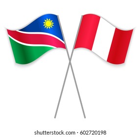 Namibian and Peruvian crossed flags. Namibia combined with Peru isolated on white. Language learning, international business or travel concept.