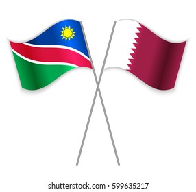 Namibian and Qatari crossed flags. Namibia combined with Qatar isolated on white. Language learning, international business or travel concept.
