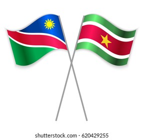 Namibian and Surinamese crossed flags. Namibia combined with Suriname isolated on white. Language learning, international business or travel concept.