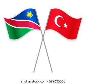 Namibian and Turkish crossed flags. Namibia combined with Turkey isolated on white. Language learning, international business or travel concept.