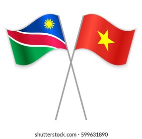 Namibian and Vietnamese crossed flags. Namibia combined with Vietnam isolated on white. Language learning, international business or travel concept.