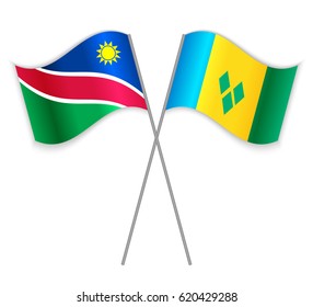 Namibian and Vincentian crossed flags. Namibia combined with Saint Vincent and the Grenadines isolated on white. Language learning, international business or travel concept.