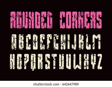 Narrow sanserif font with rounded corners. Typeface with shabby texture. Print on black background