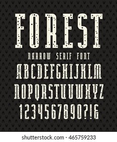 Fuente serif estrecha con textura moteada. Cara atrevida. Estampado blanco sobre fondo negro